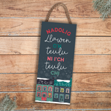 Large sign / Nadolig Llawen wrth ein teulu ni i’ch teulu chi / Merry Christmas from our family to yours